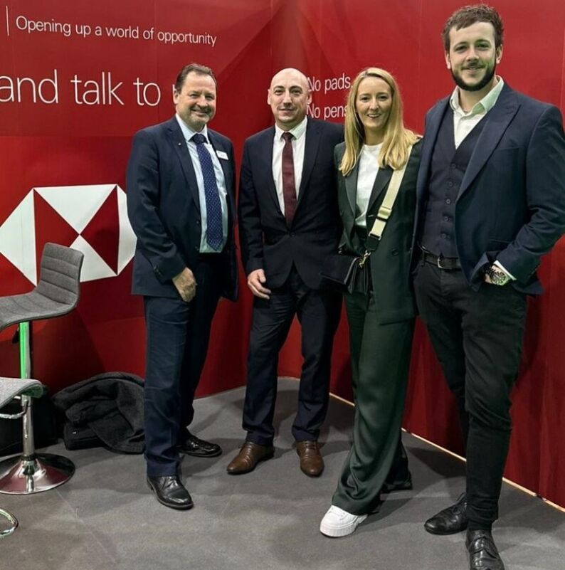 Jade Pinkerton and Louis Mason from Oportfolio Mortgages with representatives of HSBC